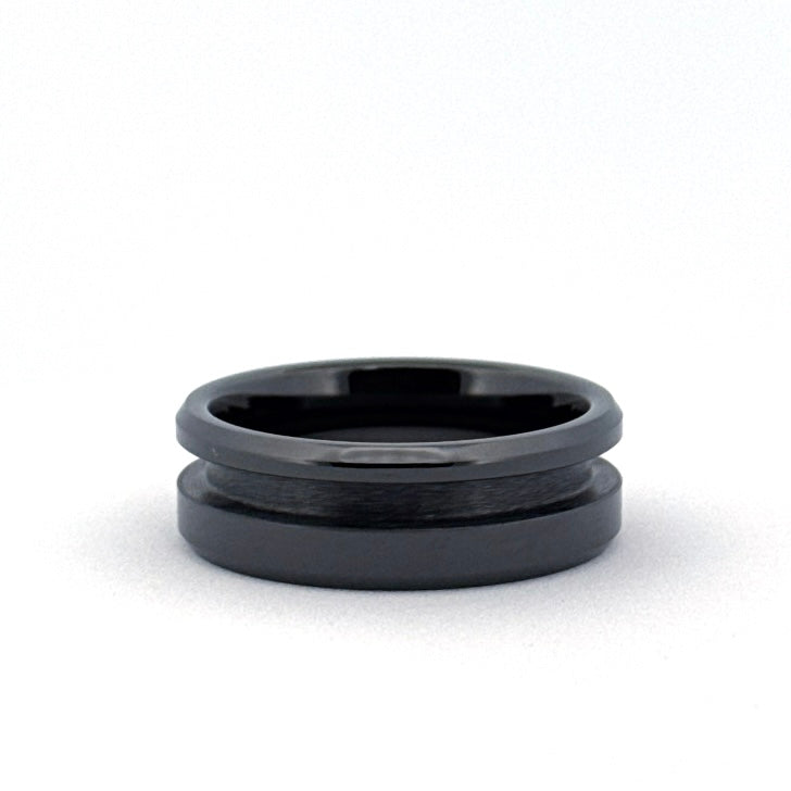 The Jaxson Ring in high-polish black ceramic with offset inlay channel.