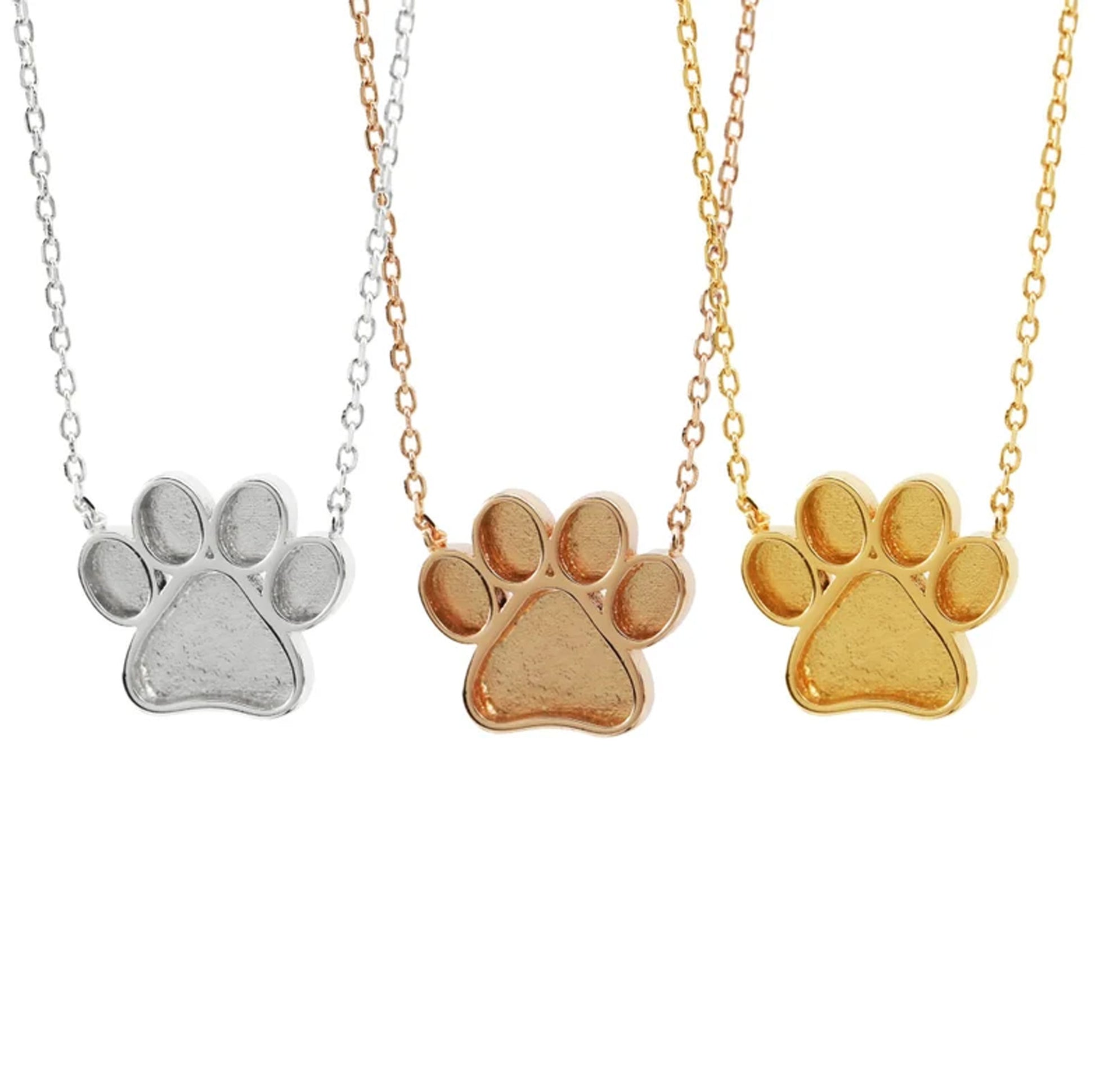 The Aria Necklace available in sterling silver, 14k and 18k solid gold, available with custom inclusions like ashes, fabric or fur.