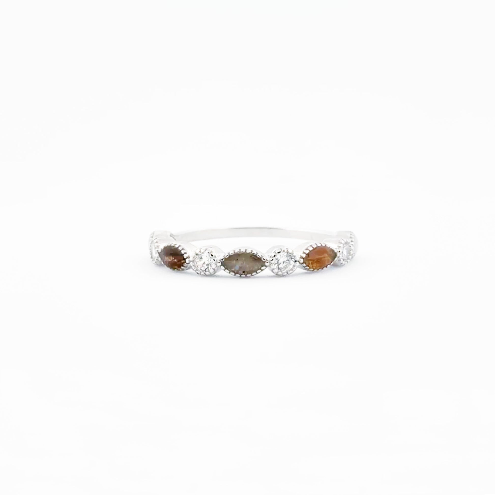 Closeup of Aurora Ring Stack band, Blessings, featuring the various design and personalized inclusions.