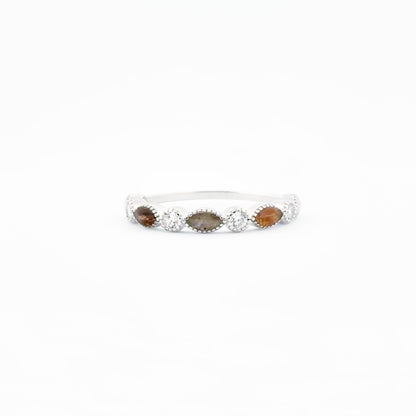 Closeup of Aurora Ring Stack band, Blessings, featuring the various design and personalized inclusions.