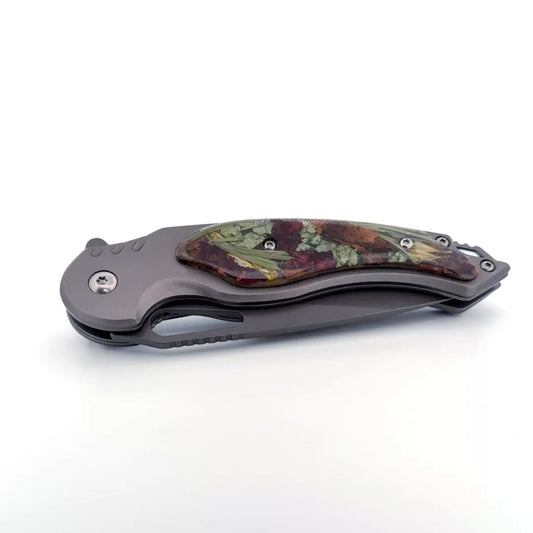 MTech Customizable Knife with a stainless steel drop point blade and personalized handle for custom inclusions.
